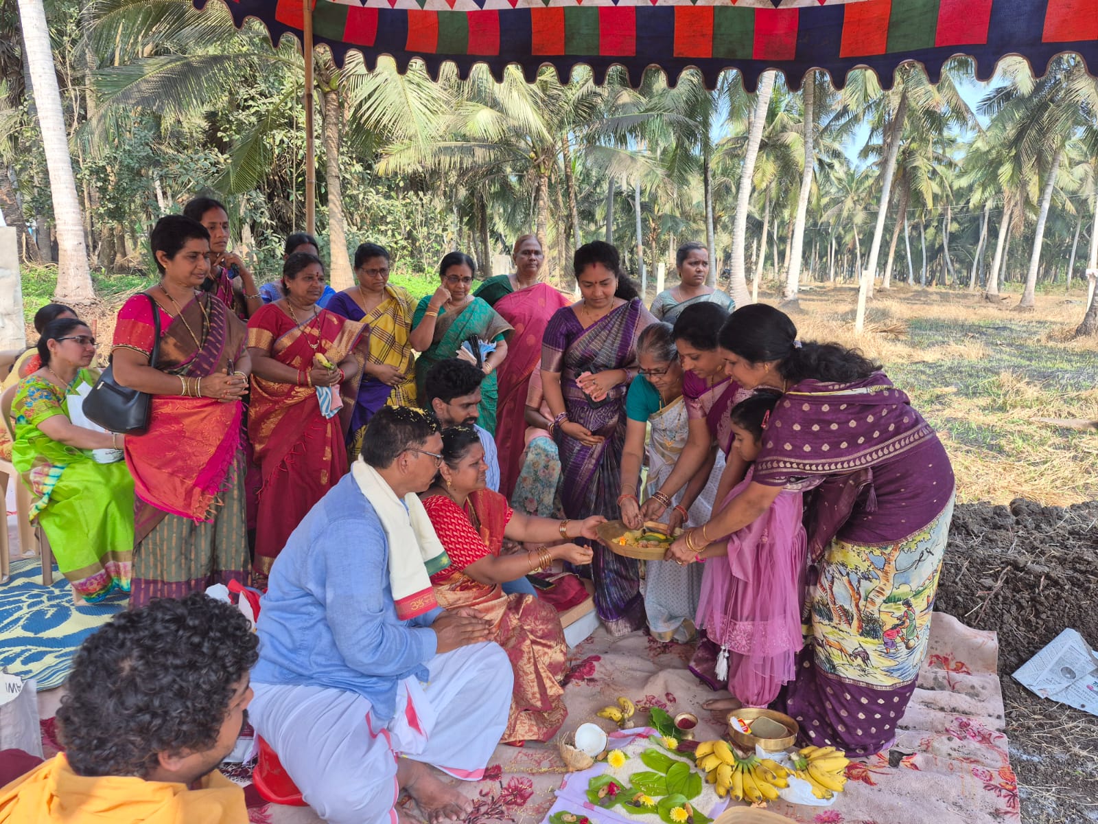 Relatives gathered under the canopy for the ceremony