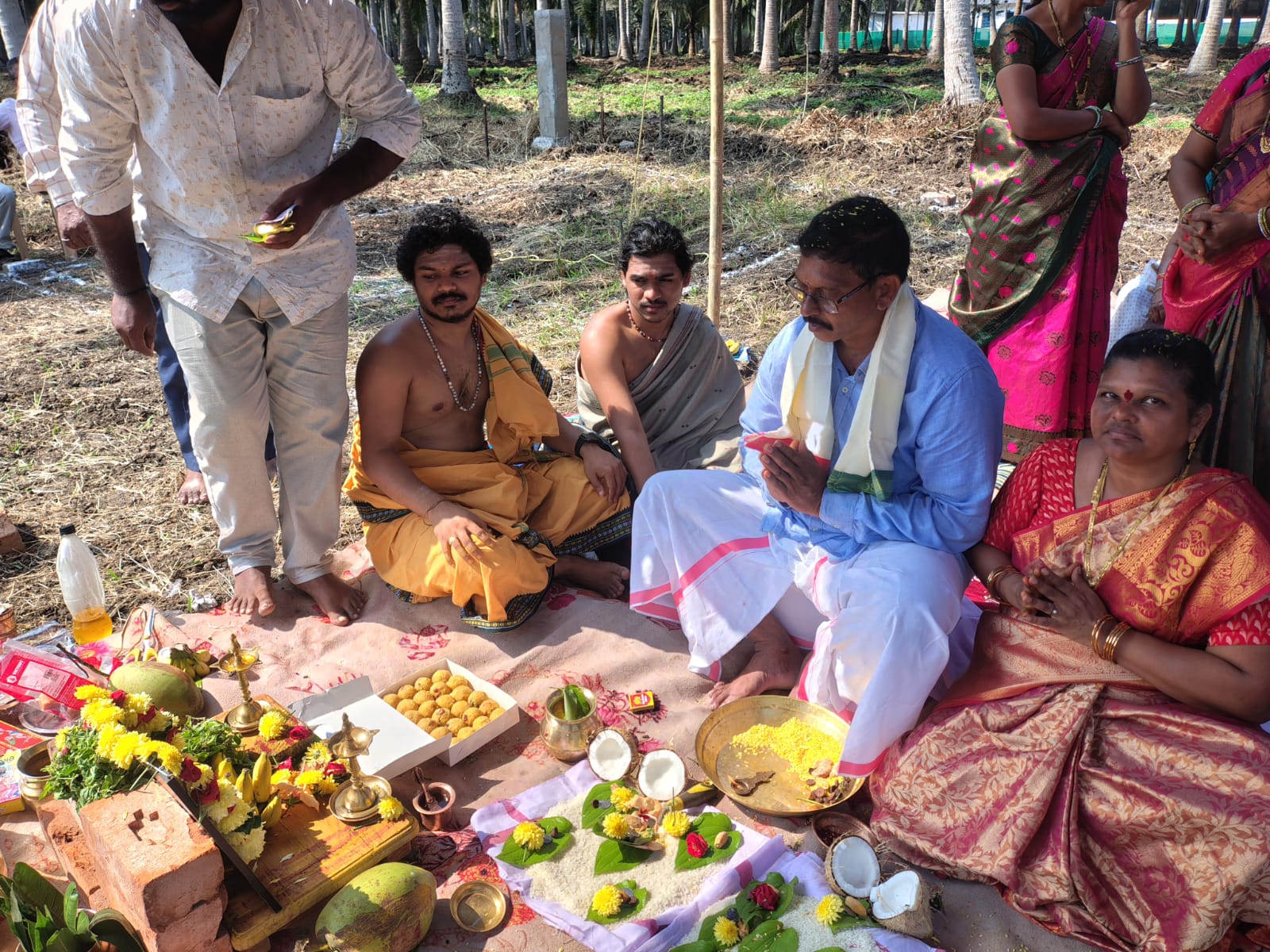 Family seated for the bhoomi puja rituals